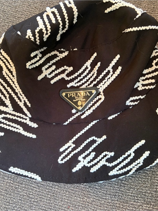 Prada Accessories - Prada Black Bucket Hat with White Zigzag Embellishment